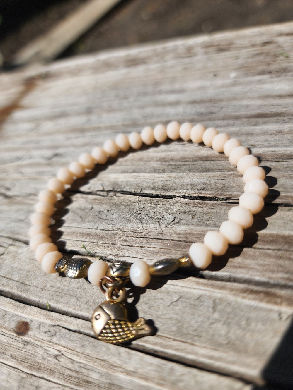 Delicate Cream Beaded Bracelet with Gold Fish Charm